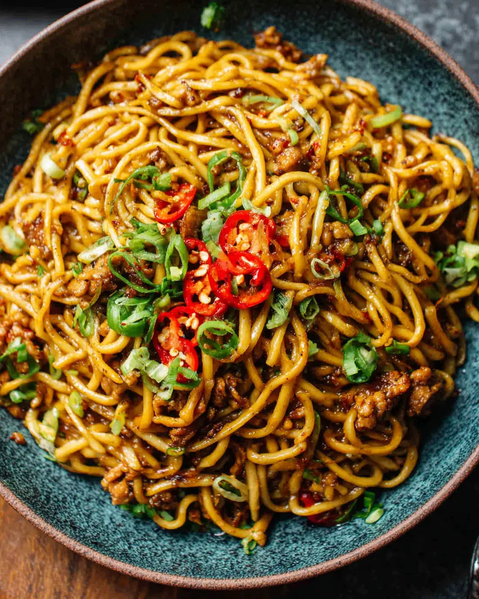 spicy garlic noodle stir fry duck breast close up