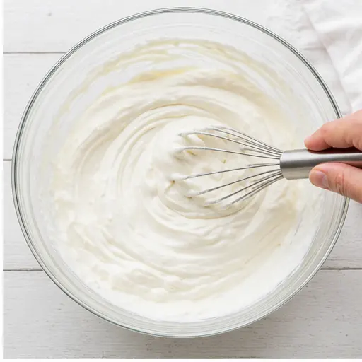 Whisking the creamy dressing