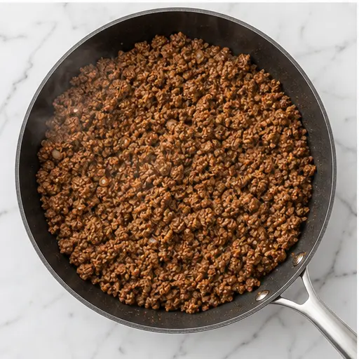 Step 3: Drain fat and finish cooking the beef