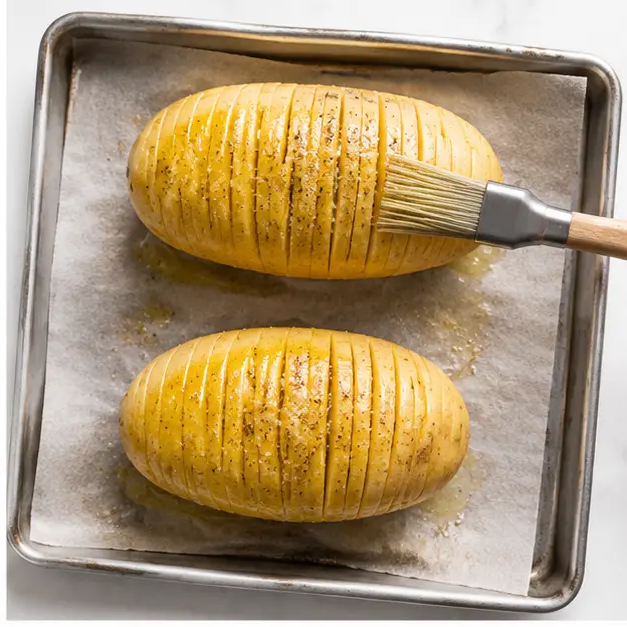 Step 2: Brushing with melted vegan butter before first bake