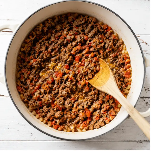 Step 1: Browning ground beef with bell pepper and onion