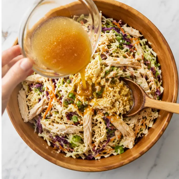 Step 4: Pouring vinaigrette and tossing everything together
