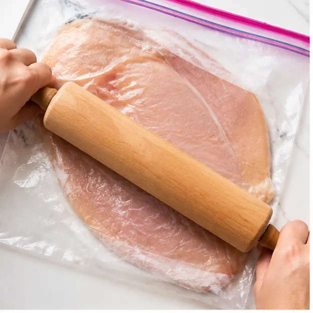Step 1: Pound chicken fillets flat