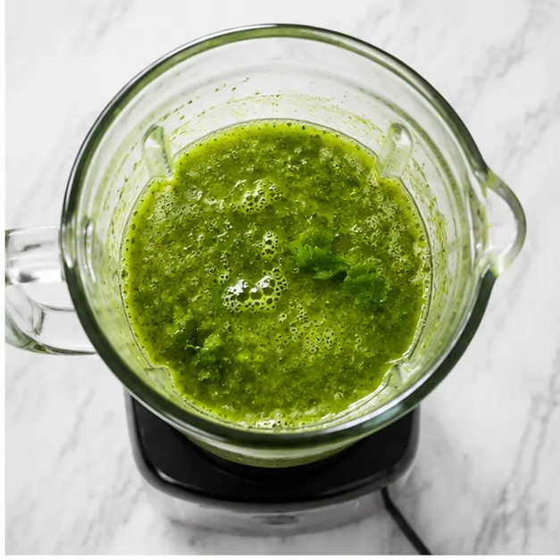 Step 2: Blend cooked vegetables with tomatillos and cilantro into smooth verde sauce
