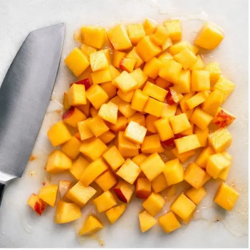 Step 1: Dicing ripe peaches into small cubes