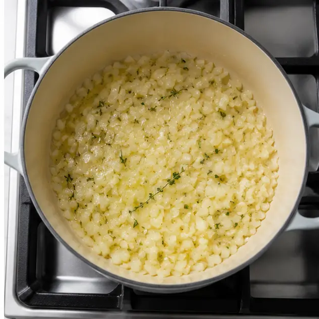 Step 2: Sautéing onions and thyme in butter