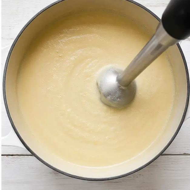 Step 4: Blending soup with immersion blender until smooth