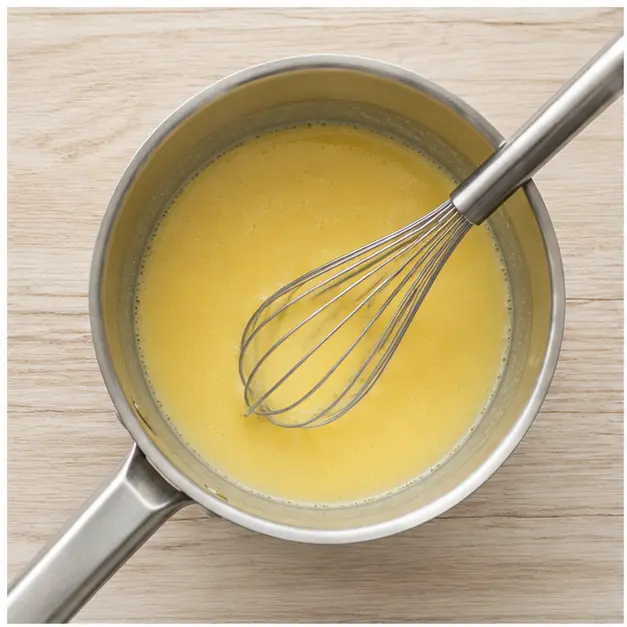 Step 1: Whisk egg yolks, water, lemon juice, and mustard.