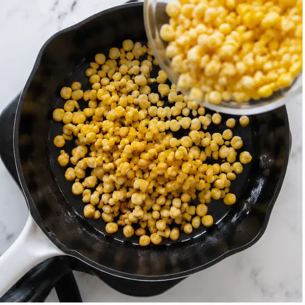 Step 1: Charring frozen corn in a hot skillet
