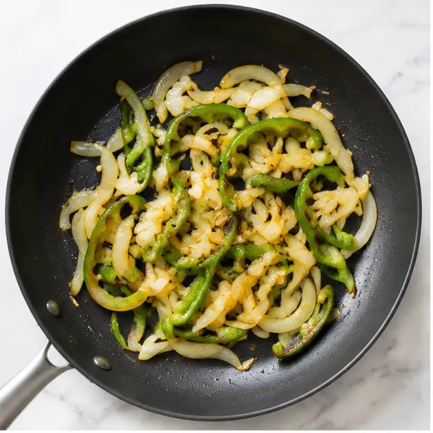 Step 1: Sauté onion and bell pepper until soft