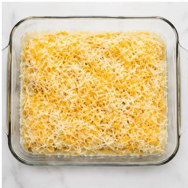 Step 4: Sprinkle shredded cheeses over the top