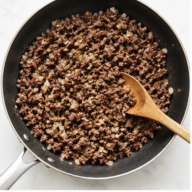 Step 1: Browning ground beef and onion