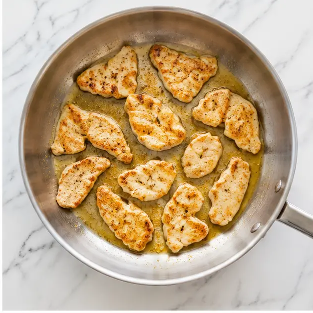 Step 2: Searing chicken breast fillet pieces until golden brown