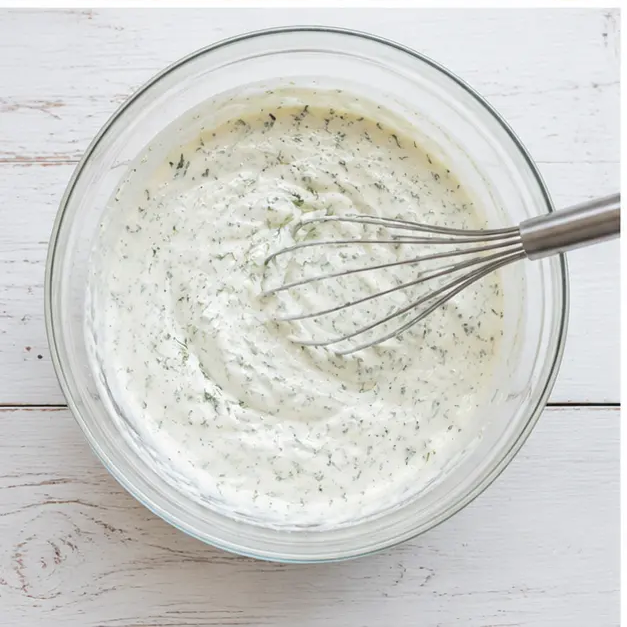 Step 3: Whisking the creamy yogurt-dill dressing