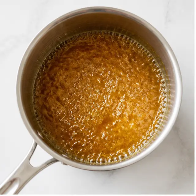 Step 1: Simmer apple cider until syrupy and reduced
