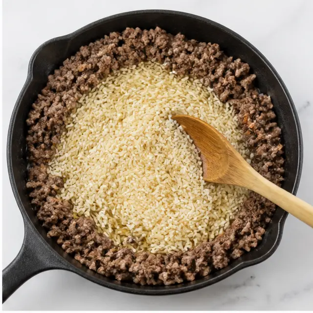 Step 2: Toasting the jasmine rice in olive oil