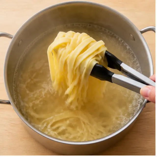 Step 1: Boiling the fettuccine until al dente in heavily salted water