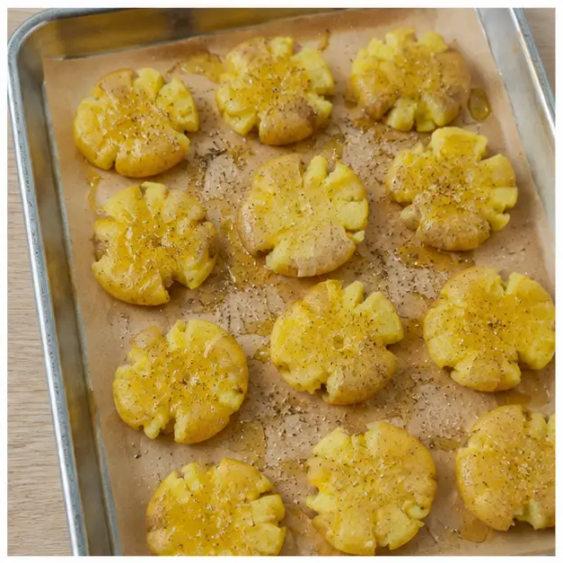 Brush smashed potatoes with olive oil