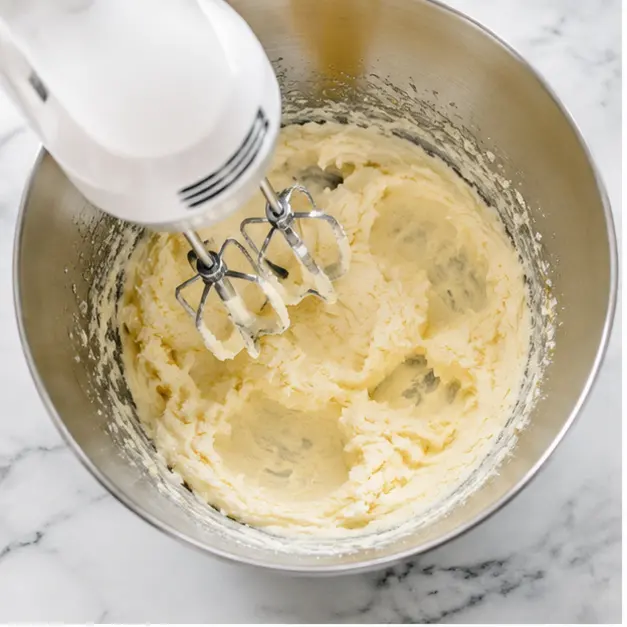 Cream softened butter and sugar until pale and fluffy