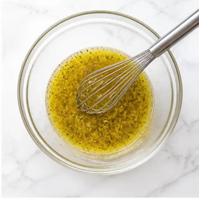 Step 2: Whisking the lemon vinaigrette dressing