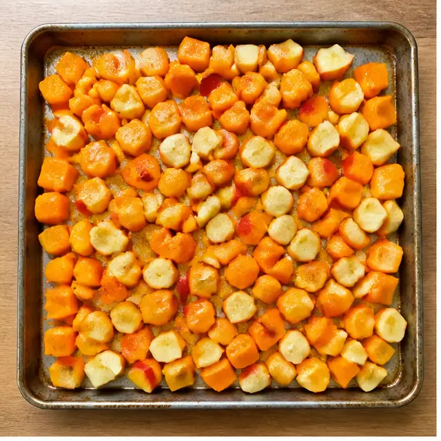 Step 1: Toss cubed squash and diced apples with olive oil on a sheet pan