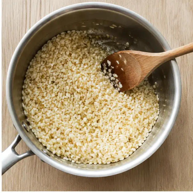 Step 2: Toast Arborio rice until the edges turn translucent