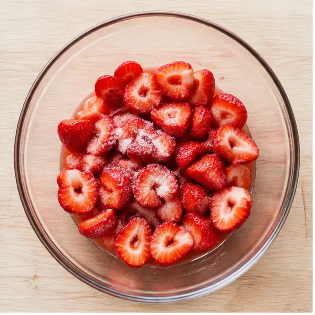 Step 1: Macerate the sliced fresh strawberries with sugar until juices form.